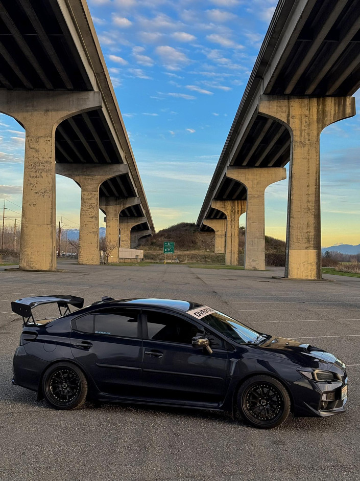 Sebastian S's 2017 WRX Upgraded Head Unit and Sound system with a carbon fiber steering wheel and carbon E-Brake