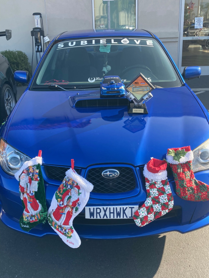 Lester M's 2006 Impreza WRX TR Comes with matching Remote control car, Hot Wheel and 3D miniature as well as Subie
