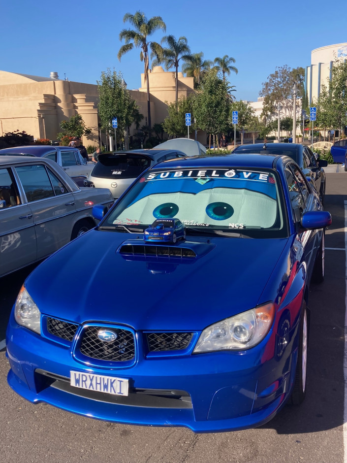 Lester M's 2006 Impreza WRX TR Comes with matching Remote control car, Hot Wheel and 3D miniature as well as Subie
