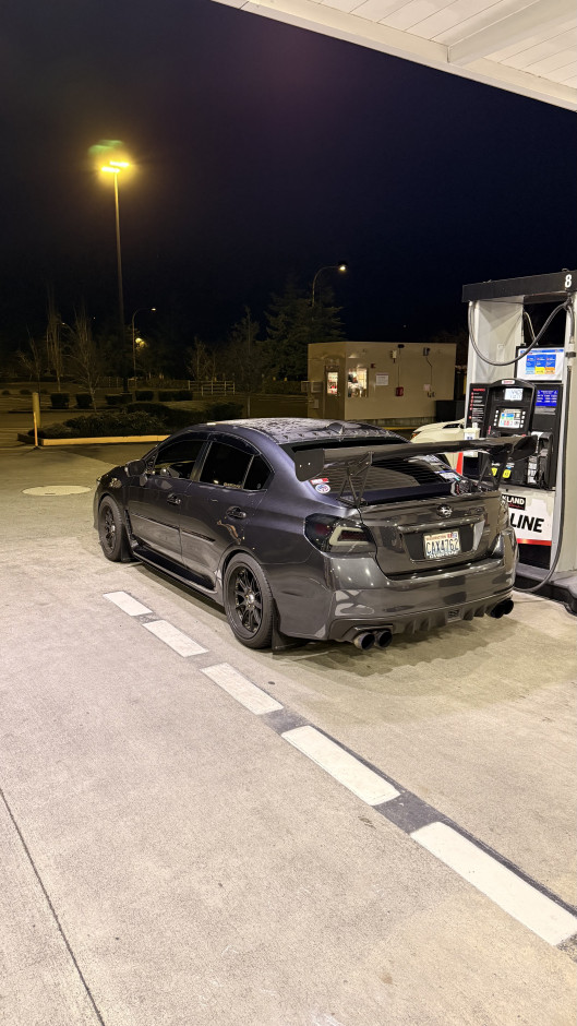 Sebastian S's 2017 WRX Upgraded Head Unit and Sound system with a carbon fiber steering wheel and carbon E-Brake