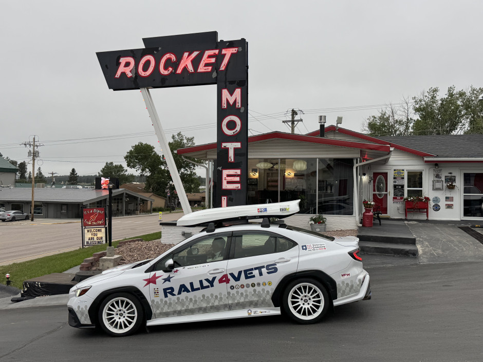 Robert H's 2022 WRX GT Swift Springs, Aeroflow Dynamics color-matched side skirts and rear bumper, white GMR wheel